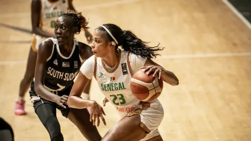 Basketball players competing during an international game